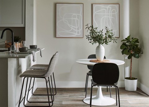 Atrio Apartments Model Kitchen and Dining Area