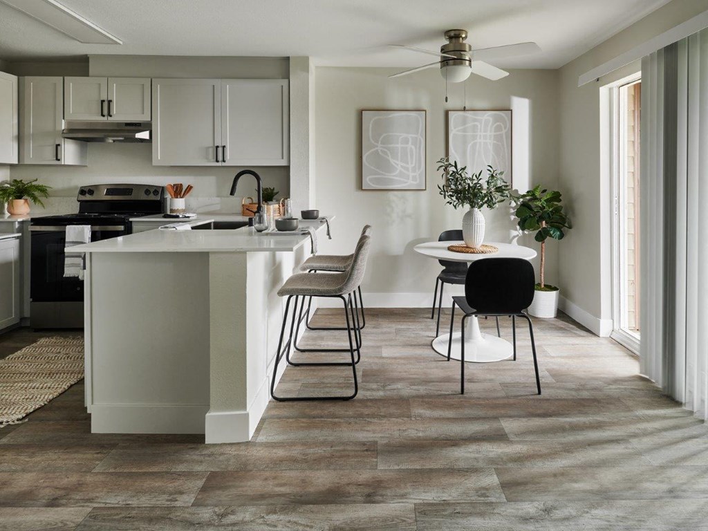 Atrio Apartments Model Kitchen and Dining Area