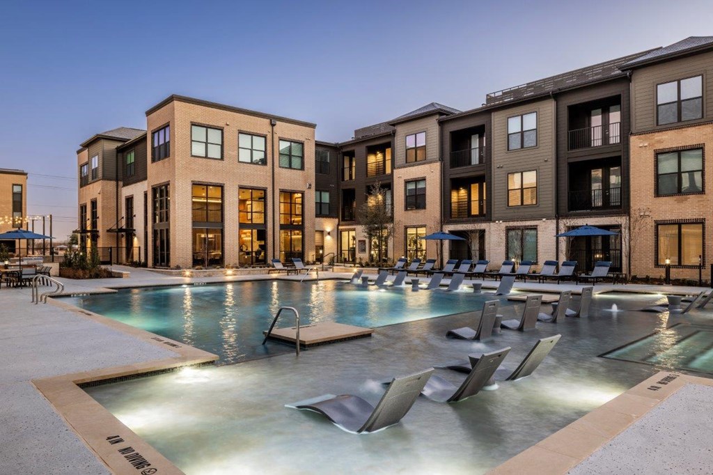 Aura 3Twenty Apartments in McKinney, Texas Pool with Lounge Chairs