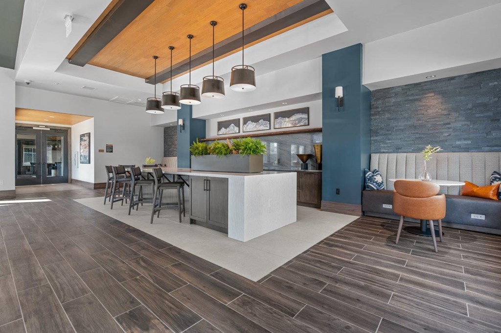 a kitchen and dining area in a modern apartment
