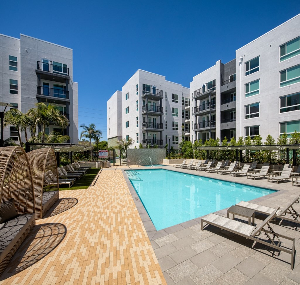 Park on First Apartments Pool Area and Lounge Chairs
