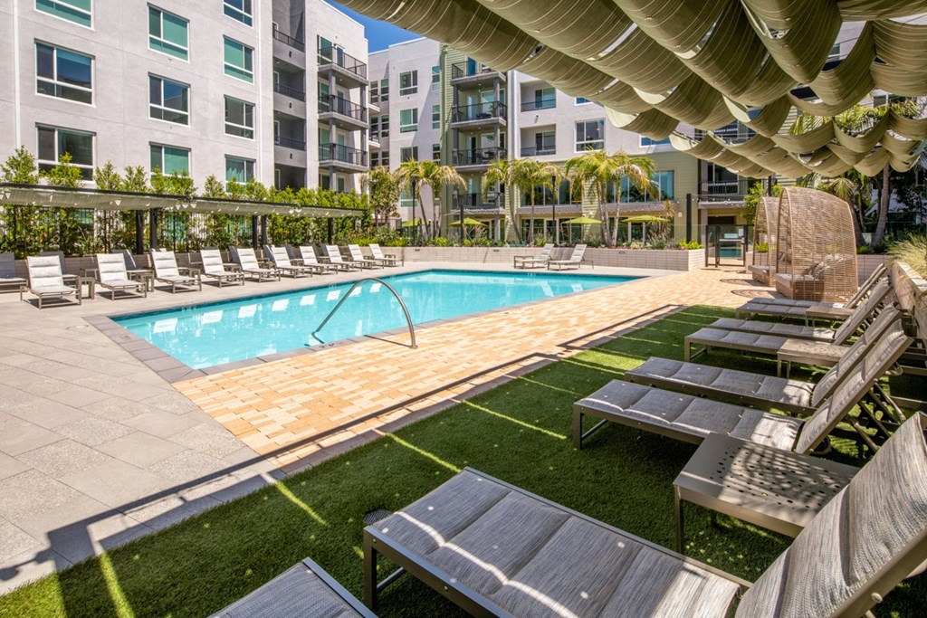 Park on First Apartments Pool Area and Lounge Chairs