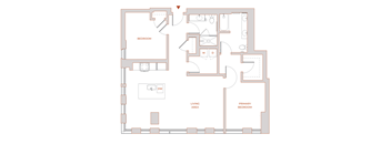 A floor plan of a house with a living area, a primary bedroom, and a bedroom.