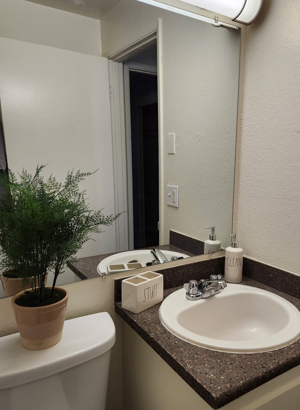 Wisteria Walk bathroom with a sink and toilet