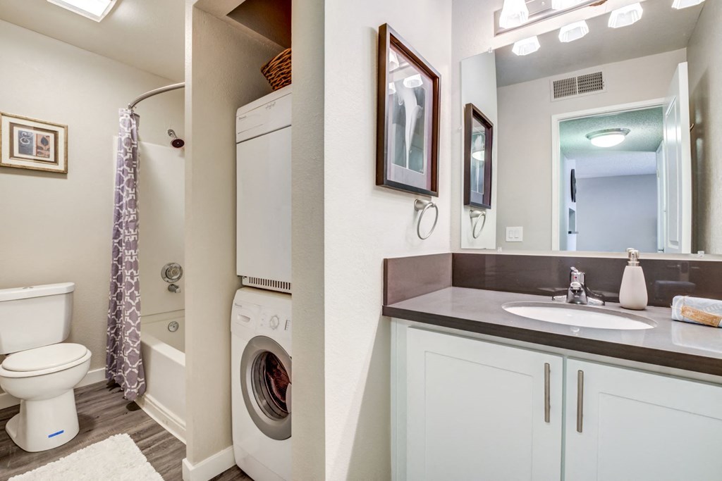 The Alexandar Apartments Bathroom with Washer and Dryer