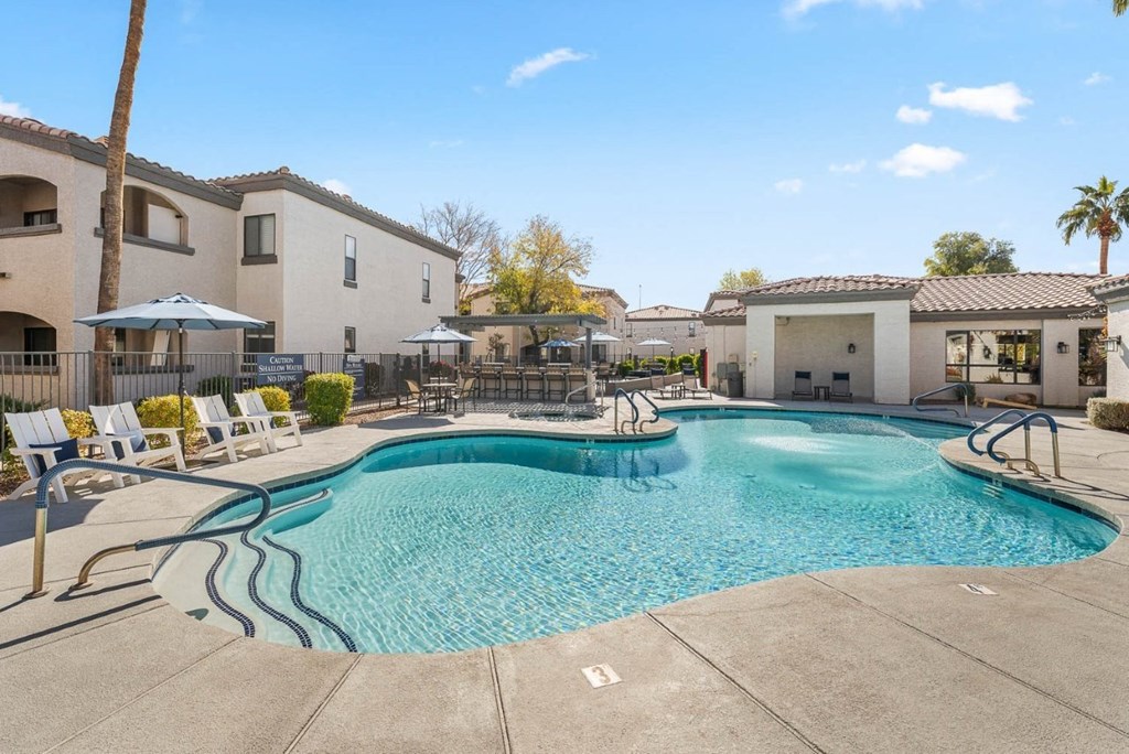 Bayside Apartments in Phoenix, Arizona Pool with Lounge Chairs