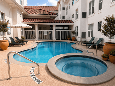 A pool with a sign that says "No Diving" in the middle of it.