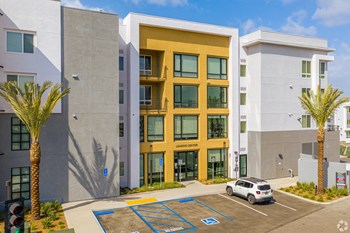 Jefferson La Mesa Apartments Building Exterior and parking lot - Photo Gallery 9