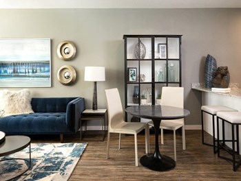 Parkside at Round Rock Apartments Model Living Room and Dining Room - Photo Gallery 4