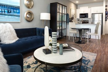 Parkside at Round Rock Apartments Model Living Room, Dining Room and Kitchen - Photo Gallery 3
