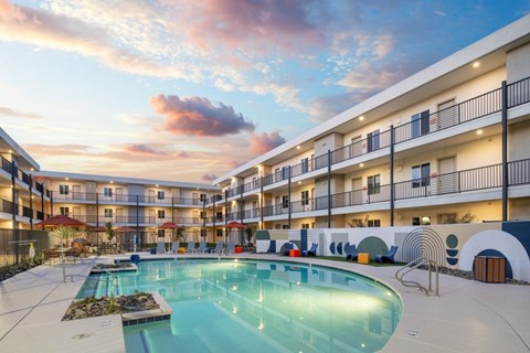 Cabana Aldea New Apartments in Glendale, Arizona Exterior and Pool at Dusk