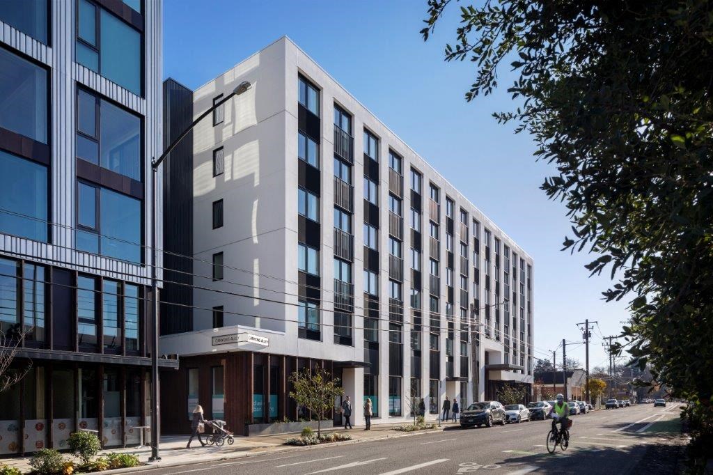 a new building on the corner of a city street