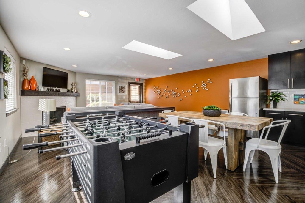 Cascadia Pointe Apartments in Everett, Washington Clubhouse Lounge and Kitchen with Games