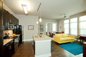 Trove Southtown Open Layout Kitchen with Island and Living Room Trove Southtown Open Layout Kitchen with Island and Living Room - Photo Gallery 3