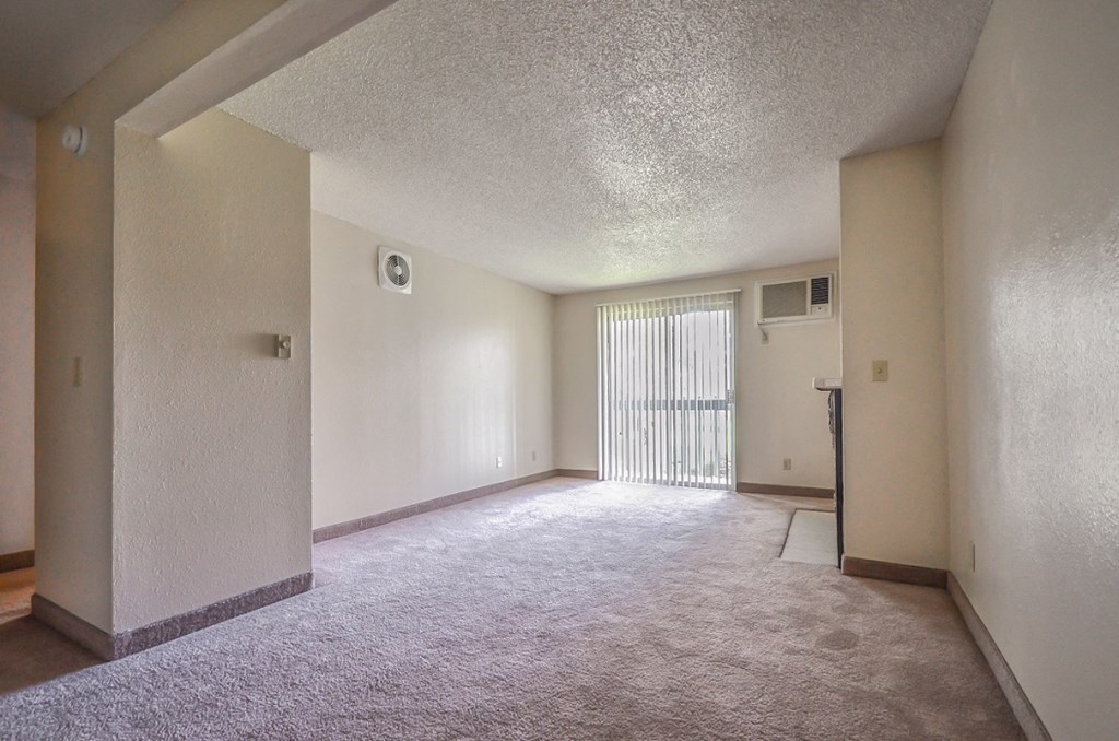 Clearwater Square Apartments Living Room and Patio Door