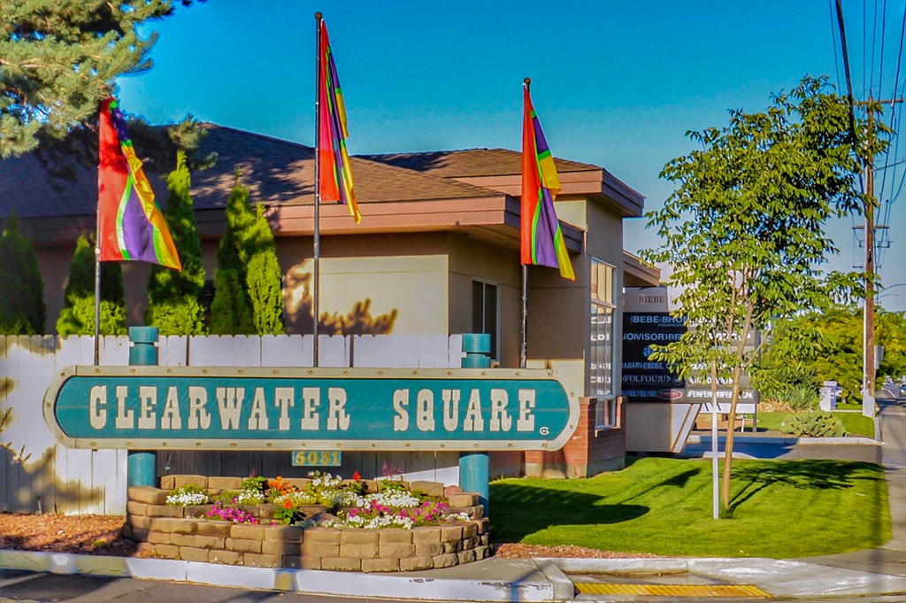 Clearwater Square Apartments Exterior Sign and Flags
