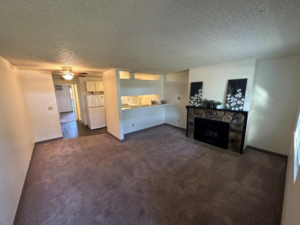 Clearwater Square Apartments in Kennewick, Washington Living Room with Fireplace