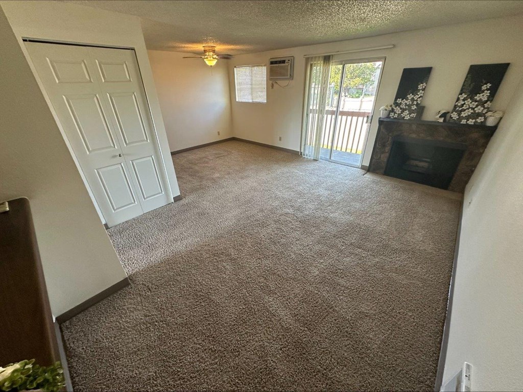 Clearwater Square Apartments in Kennewick, Washington Living Room with Fireplace