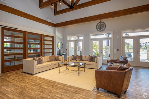 a living room with couches and a coffee table