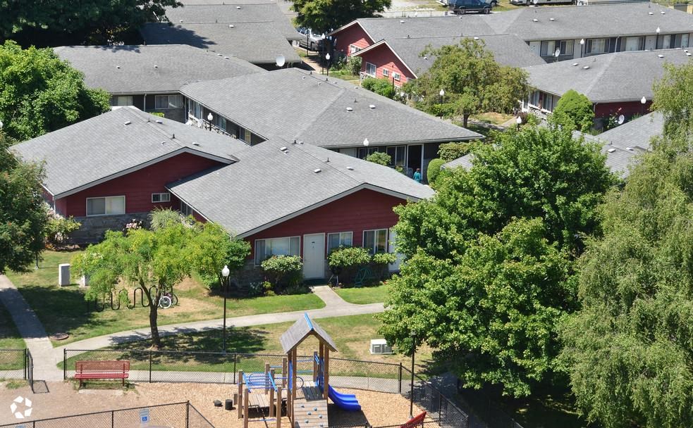 an aerial view of a neighborhood with a playground