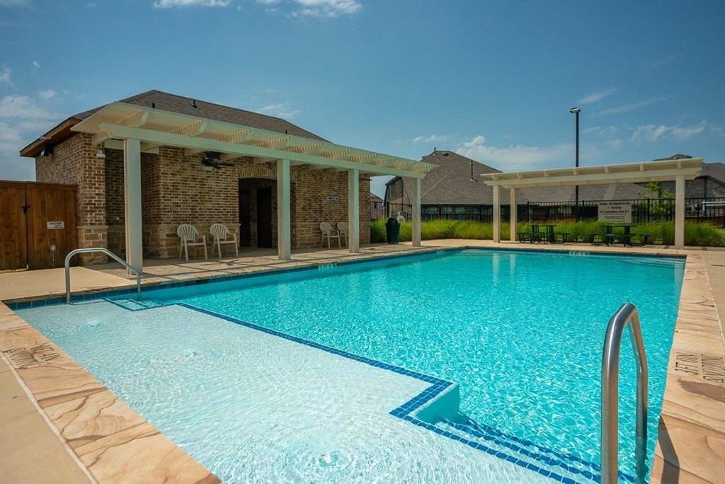 Cottages at the Realm Pool with Lounge Chairs
