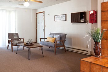 Crown Village Apartments Leasing Center Seating Area - Photo Gallery 6