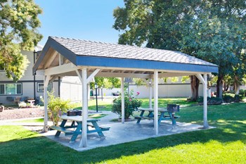 Crown Village Apartments Outdoor Ramada with Picnic Tables - Photo Gallery 3