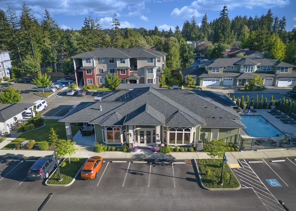 Little Tuscany Apartments & Townhomes - Aerial View of Clubhouse, Outdoor Pool, Apartment Building, Townhomes, Parking Lot