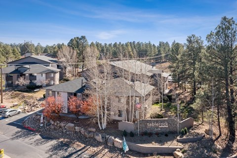A house with the name Tablerock on it is surrounded by trees.