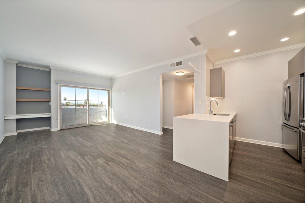 Boulevard on Wilshire Living Room with Shelves and Patio