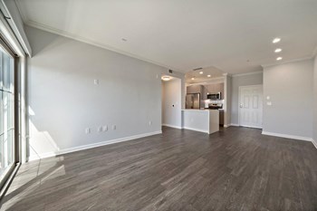 Boulevard on Wilshire Living Room with Kitchen and Entrance View Boulevard on Wilshire Living Room with Kitchen and Entrance View - Photo Gallery 3