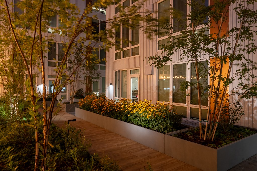 The Warren Apartments patio at night