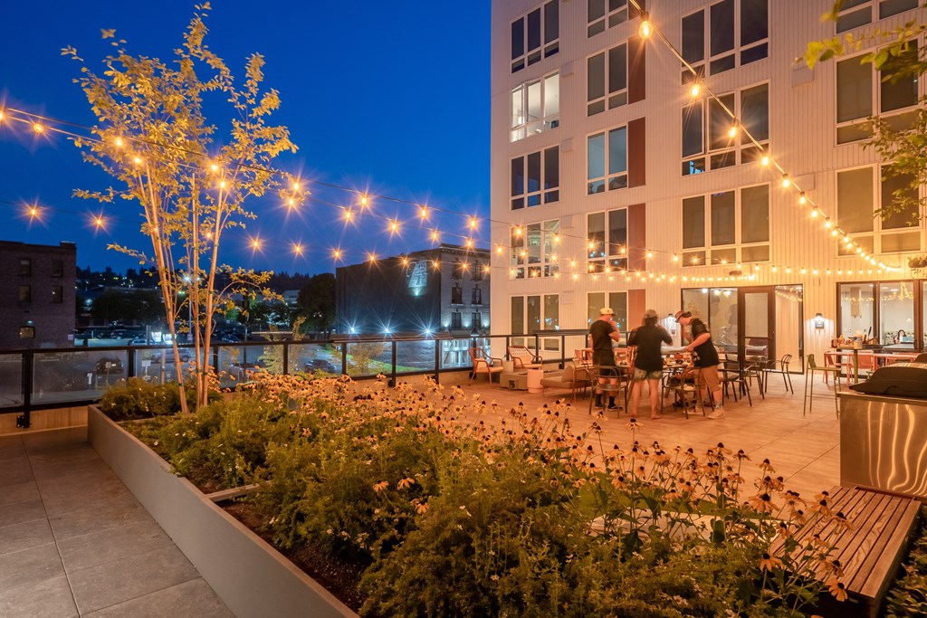 The Warren Apartments patio dining at night