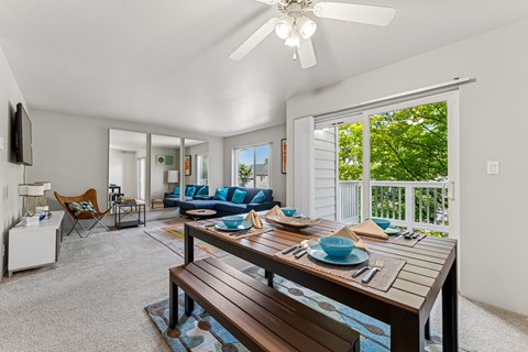 A dining table with a bench and a bowl on it.