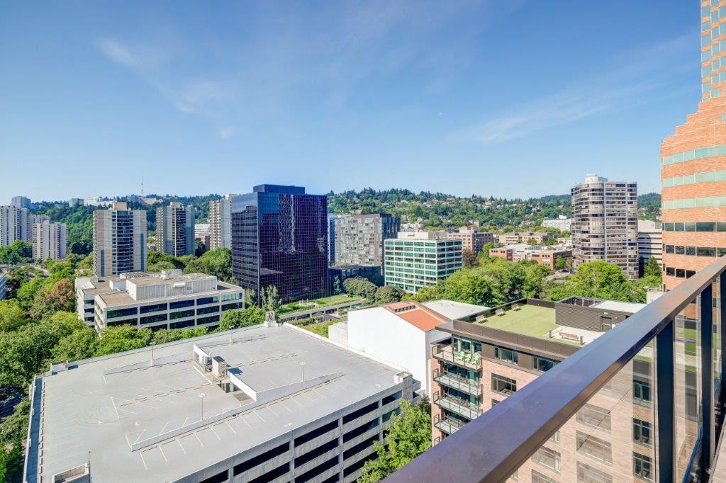 a balcony with a view of the city