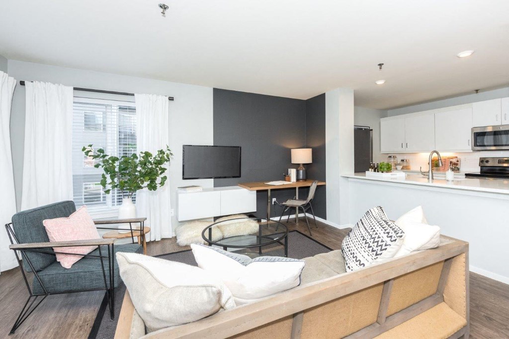 a living room with a couch and a table