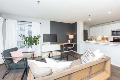 a living room with a couch and a table