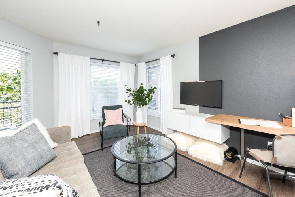 a living room with a couch and a table