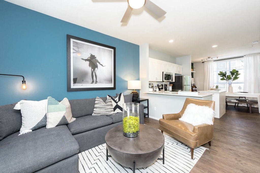 a living room with a couch and a table