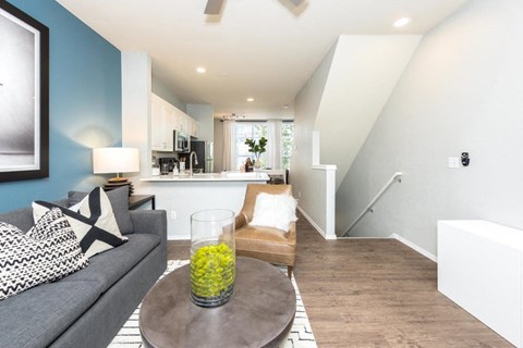 a living room with a couch and a table