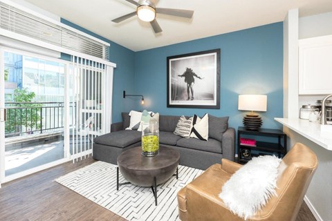 a living room with a couch and a table