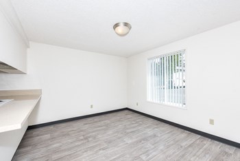 Wellington Court Townhomes Dining Area and Window - Photo Gallery 6