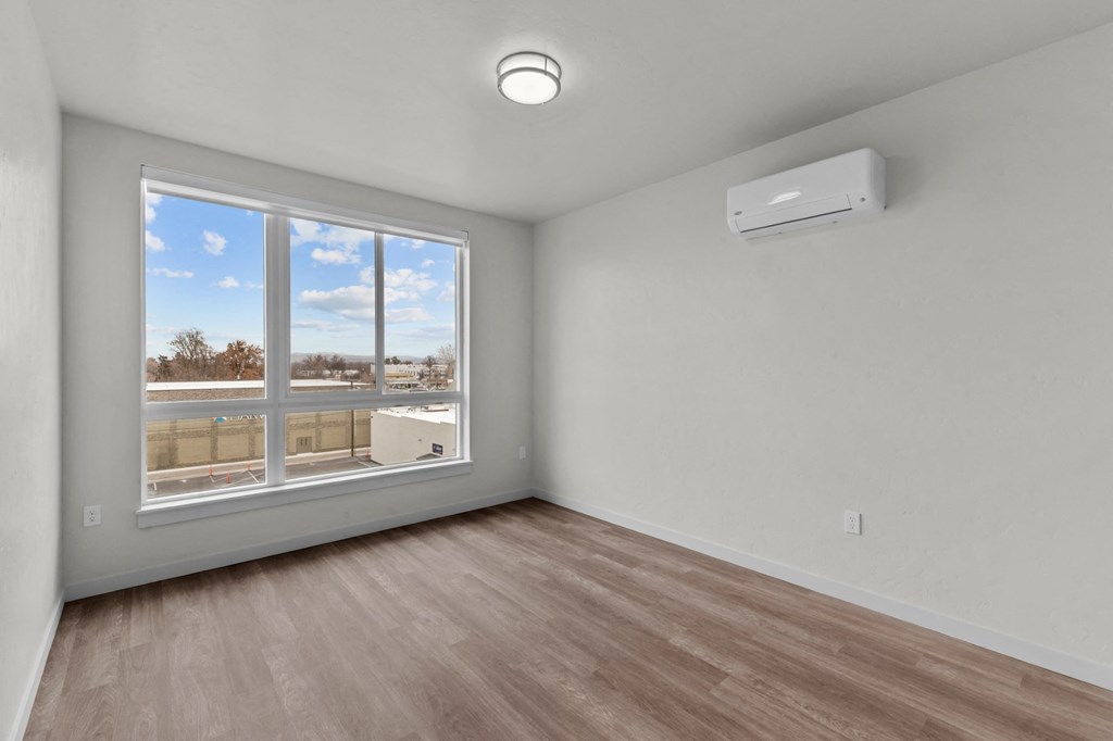 Old Town Lofts Bedroom with Large Window