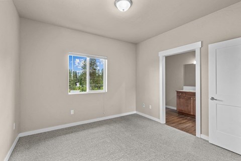Dakota Flats Apartments in Spokane, Washington Bedroom with Attached Bathroom