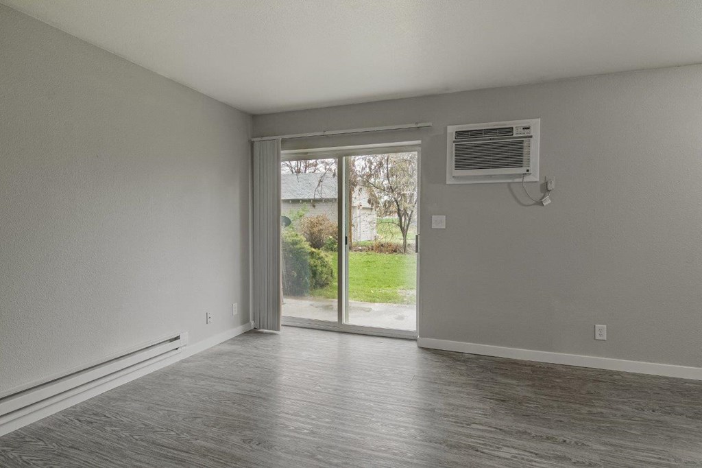 Deer Creek Apartments in Boise, Idaho Living Room with Private Patio