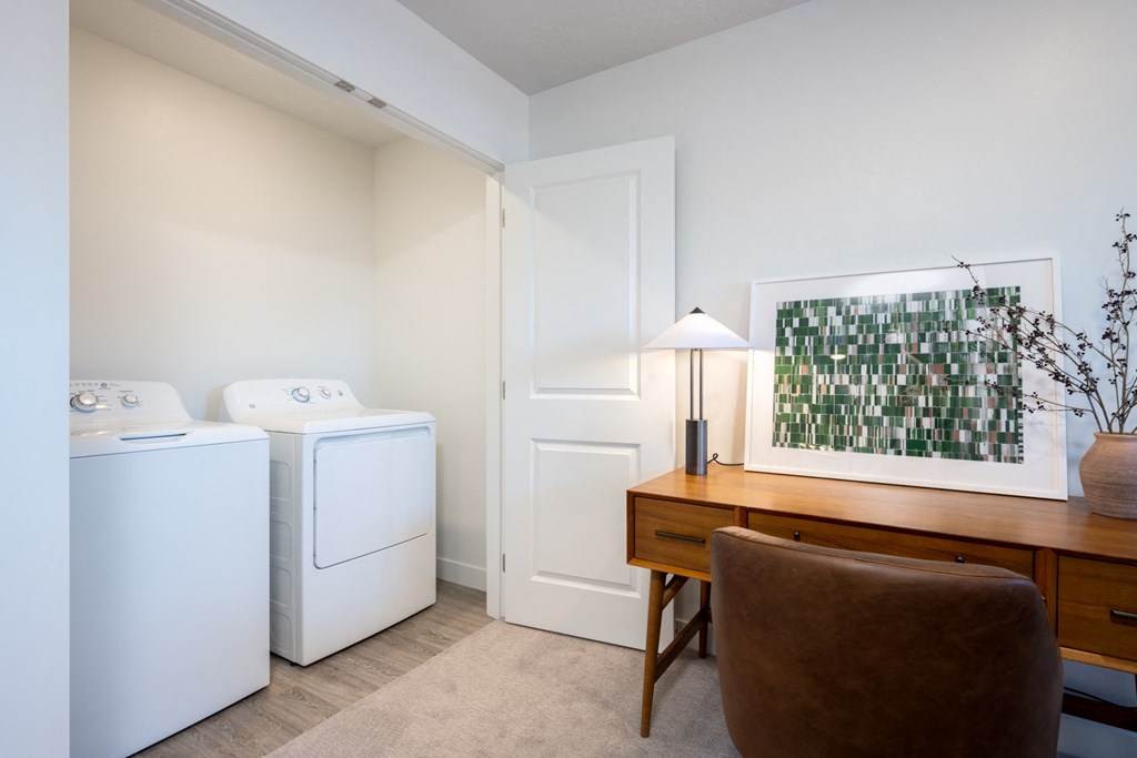 Desert Village Townhomes washing machines and a desk