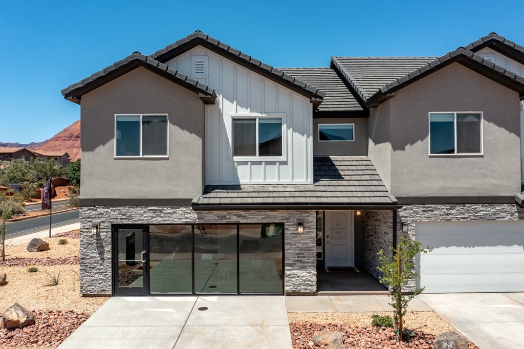 new home in a community with mountains in the background