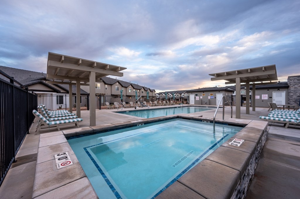 Desert Village Townhomes swimming pool with lounge chairs