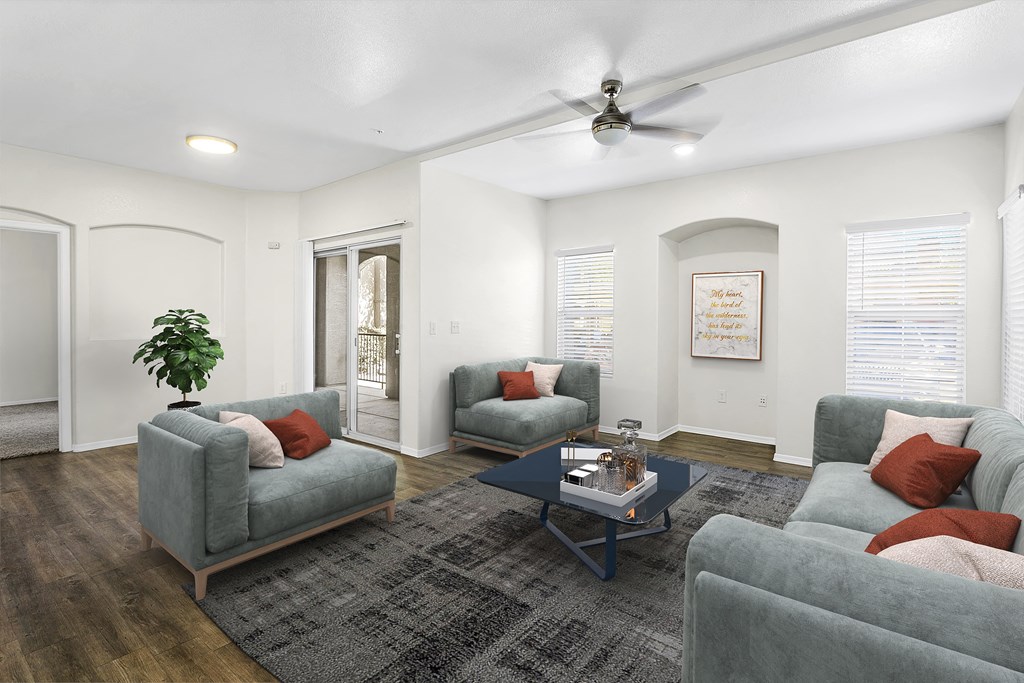 a living room with couches and a coffee table