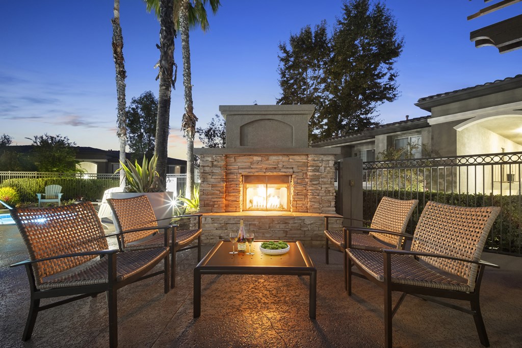 Estancia at Mission Grove Apartments Fireplace at Night